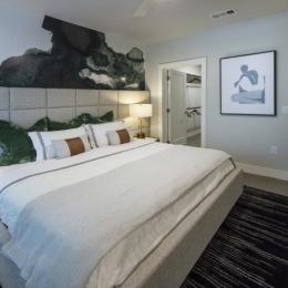a bedroom with a large bed