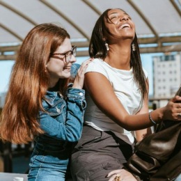 A group of women laughing.